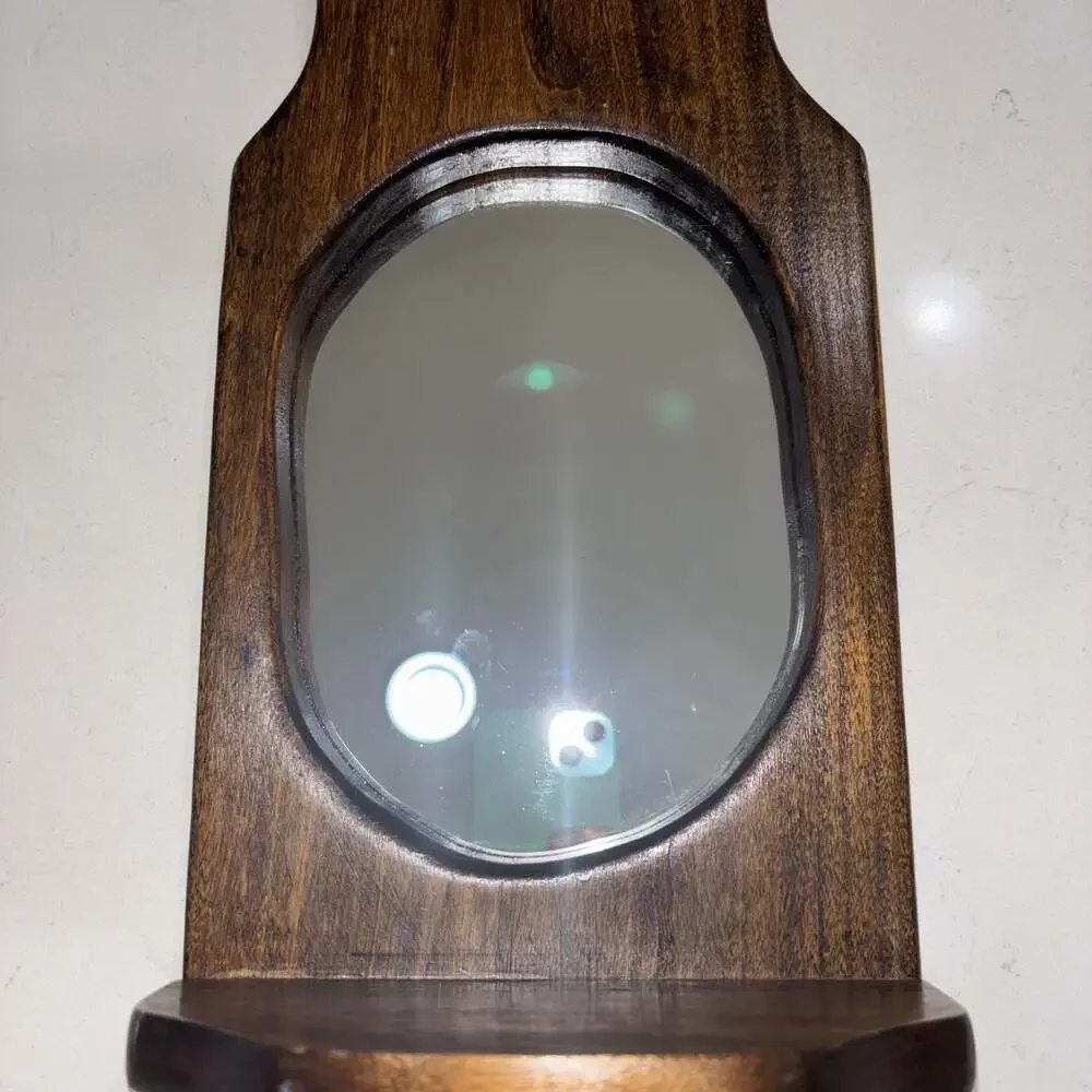 Vintage Wall-Mounted Dark Wood Sconce with Oval Mirror and Shelf